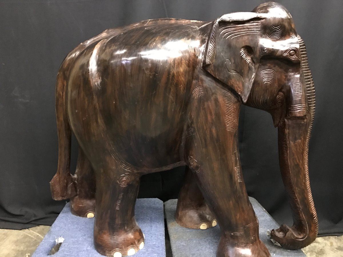 LARGE SOLID EXOTIC WOOD CARVED ELEPHANT. CARVING MEASURES 36" TALL X