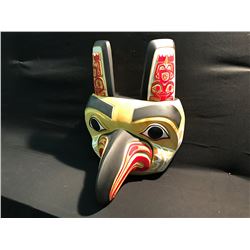 EAGLE AND FROG FEAST MASK BY GITSKAN NATION'S RUPERT JEFFREY.  MASK IS CARVED IN YELLOW CEDAR, AND