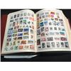 Image 2 : 2 STAMP ALBUMS (ONE LARGE, ONE SMALL) CONTAINING VARIOUS STAMPS FROM AROUND THE WORLD
