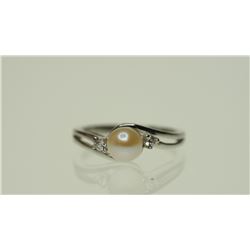 #10-10K GOLD PEARL & CZ RING SIZE 7