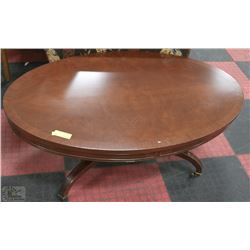 ESTATE WOOD COFFEEE TABLE ON WHEELS