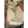 Image 1 : BEIGE LEATHER LOVE SEAT CHAIR AND OTTOMAN