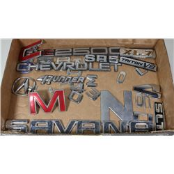 FLAT OF MIXED CAR EMBLEMS AND DECALS