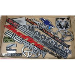 FLAT OF MIXED CAR EMBLEMS AND DECALS