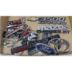 FLAT OF MIXED CAR EMBLEMS AND DECALS