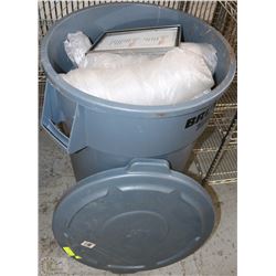 BRUTE GARBAGE CAN ON WHEELS FULL OF YOGURT CUPS