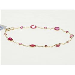 #37-14K YELLOW GOLD RUBY BRACELET