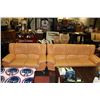 Image 1 : PEACH COLOURED LEATHER LIKE COUCH AND LOVE SEAT