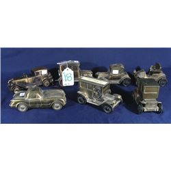 SEVEN VINTAGE BANTHRICO METAL ADVERTISING CAR BANKS