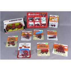 GROUP OF ERTL TRACTORS AND IMPLIMENTS