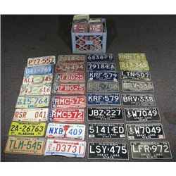 GROUP OF OVER 40 VINTAGE LICENSE PLATES