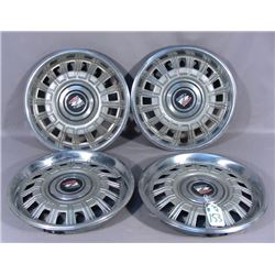 SET OF FOUR VINTAGE BUICK HUBCAPS