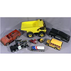 GROUP OF VINTAGE BUDDY L TRUCKS AND BUSES