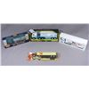 Image 1 : FOUR MISC. SEMI ADVERTISING TRUCKS