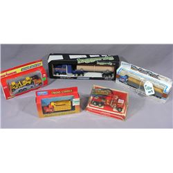 FIVE HAULER DIE CAST METAL TRUCKS