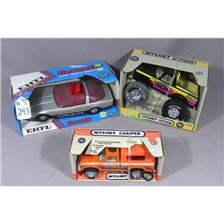 THREE BOXED VINTAGE NYLINT TRUCKS & CARS