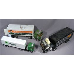 THREE VINTAGE ERTL SEMI TRUCKS WITH TRAILERS