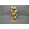 Image 1 : Carved antique elephant ivory figure of two men smoking pipes, signed on base 8" in height