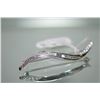 Image 1 : Lady's 18kt custom made white gold and graduated baguette cut diamond brooch set with 0.20ct of diam