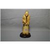 Image 1 : Antique ivory carving of an Oriental man holding a pipe 5" in height plus stand