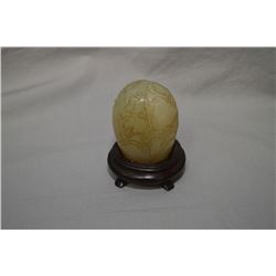 An icy Shoshan soapstone stamp, purportedly early 20th century, 3" in height plus wooden stand