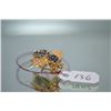 Image 2 : Lady's 14kt gold and sapphire custom made bumble bee brooch set with 0.40ct of natural round sapphir