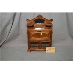 Hand crafted by master craftsman Stan Wychopen miniature drop front secretaire with beveled mirror, 