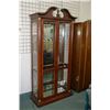 Image 1 : Modern illuminated curio/display cabinet with mirrored back, glass shelves and bevelled glass doors