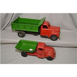 Two vintage stamped tin dump trucks including a 1954 Smith Miller B Mack