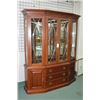Image 1 : Modern quality chest on chest oak display cabinet with illuminated interior, two glass shelves and f