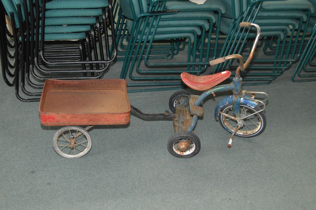 Child’s antique tricycle with wagon