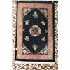 Image 1 : Oriental motif sculpted wool rug in with black background, emerald green, copper and violet accent h