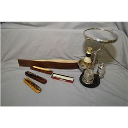 Selection of vintage shaving items including shaving mirror, brush and soap combination, selection o