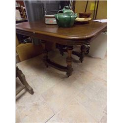 ANTIQUE TABLE ON CASTERS - WITH LEAF