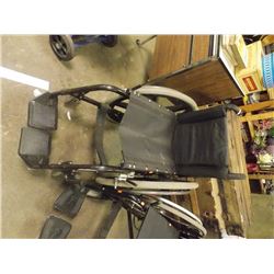 WHEEL CHAIR WITH FOOT HOLDERS