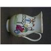 Image 1 : A WORCESTER FIRST PERIOD SPARROW BEAK CREAM JUG, c.1760, polychrome decoration of a chinaman seat...