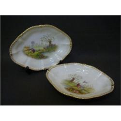A PAIR OF DERBY DESSERT DISHES, octagonal gilt gadrooned rims, painted exotic birds (old label at...