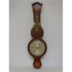 A MAHOGANY WHEEL BAROMETER, 19th Century, arched cornice, inlaid and strung, thermometer over a 2...