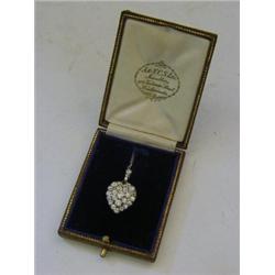 A LATE 19TH CENTURY HEART LOCKET, pave set with old cut diamonds (approximately 2ct in total) wit...