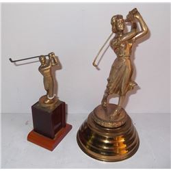 2 golf trophies