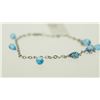 Image 2 : 10KT GOLD BLUE TOPAZ BRACELET