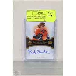 SIGN OF THE TIMES AUTOGRAPHED BOBBY CLARKE HOCKEY