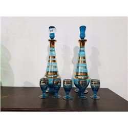 PAIR OF BOHEMIAN CRYSTAL DECANTER SETS IN AQUAMARINE