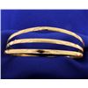 Image 1 : 3 Yellow Gold 18k Engraved Bangle Bracelets!