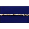 Image 1 : 1.50 Carat Diamond Baguette Channel Set 10K Yellow Gold Bracelet