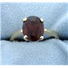 Image 1 : Garnet Solitaire Set in 14K Yellow Gold