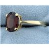 Image 2 : Garnet Solitaire Set in 14K Yellow Gold