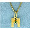 Image 1 : M Pendant with an Emerald on a 16 Inch Box Link Chain