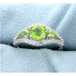 Genuine Peridot Ring accented with White Sapphire gemstones.