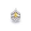 Image 1 : A Fancy Intense Yellow Diamond Cocktail Ring